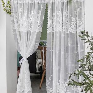 Sheer white lace curtains